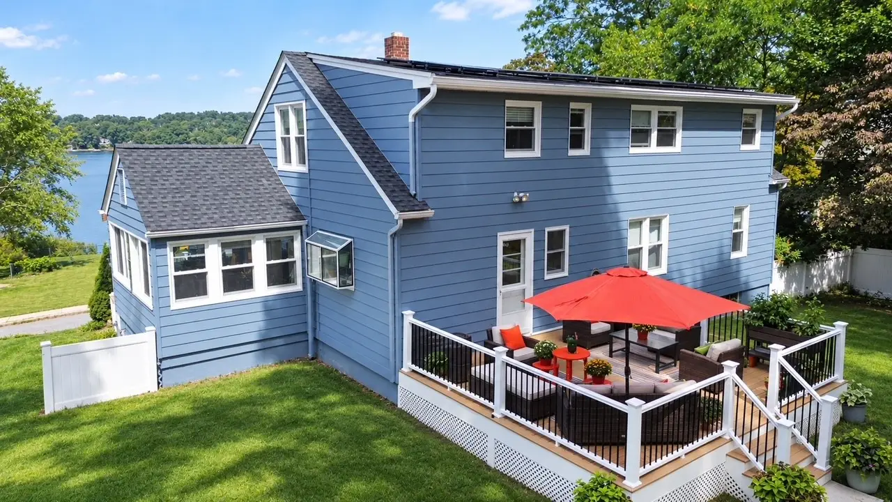 Aerial view of rear exterior painting and deck on Netcong NJ lakefront home